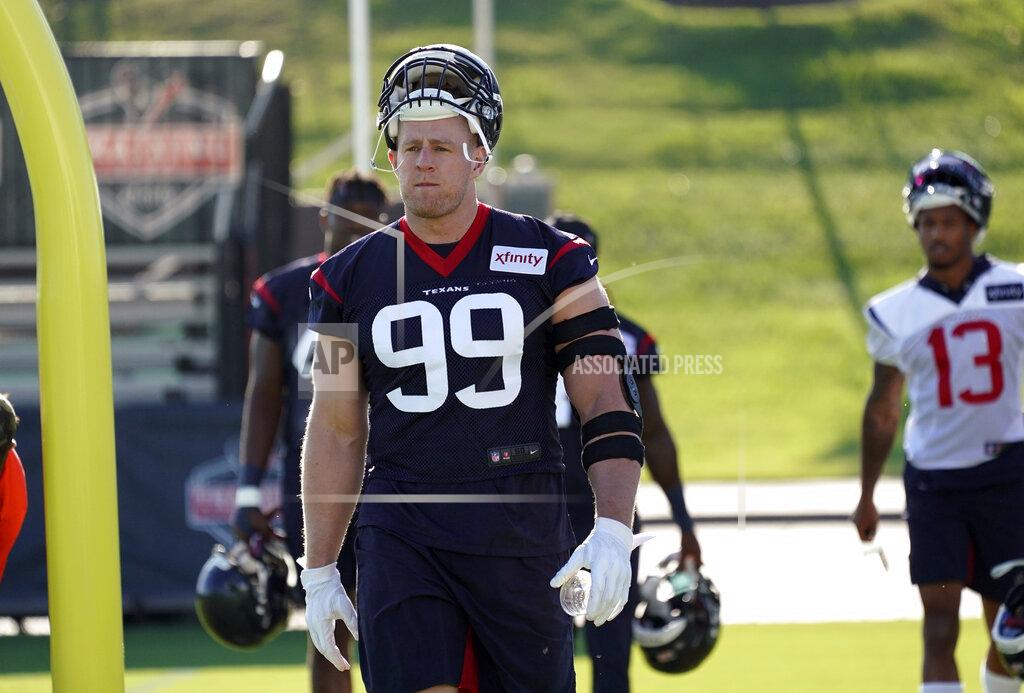 Houston Texans defensive end J.J. Watt (99) walks across the field before an NFL football training camp practice Thursday, July 25, 2019, in Houston. Watt is on the physically unable to perform list. (AP Photo/David J. Phillip)