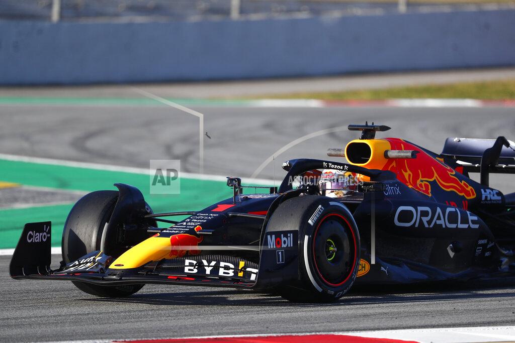 Joan Monfort Red Bull driver Max Verstappen of the Netherlands drives out of a curve during a Formula One pre-season testing session at the Catalunya racetrack in Montmelo, just outside of Barcelona, Spain, Wednesday, Feb. 23, 2022. (AP Photo/Joan Monfort)