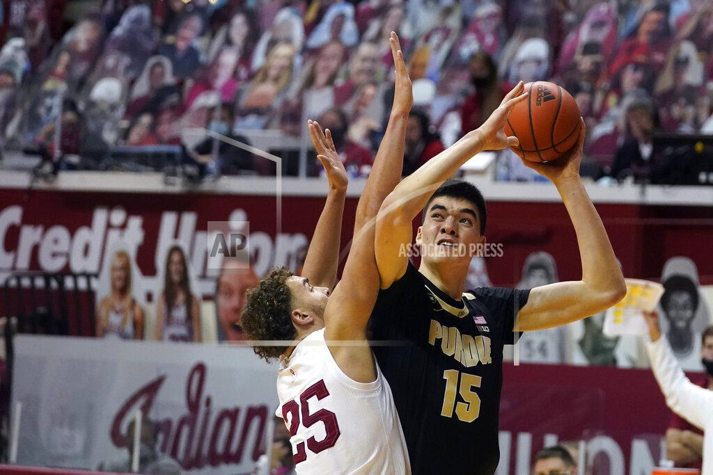 Darron Cummings Purdue's Zach Edey (15) shoots over Indiana's Race Thompson (25) during the first half of an NCAA college basketball game, Thursday, Jan. 14, 2021, in Bloomington Ind. (AP Photo/Darron Cummings)