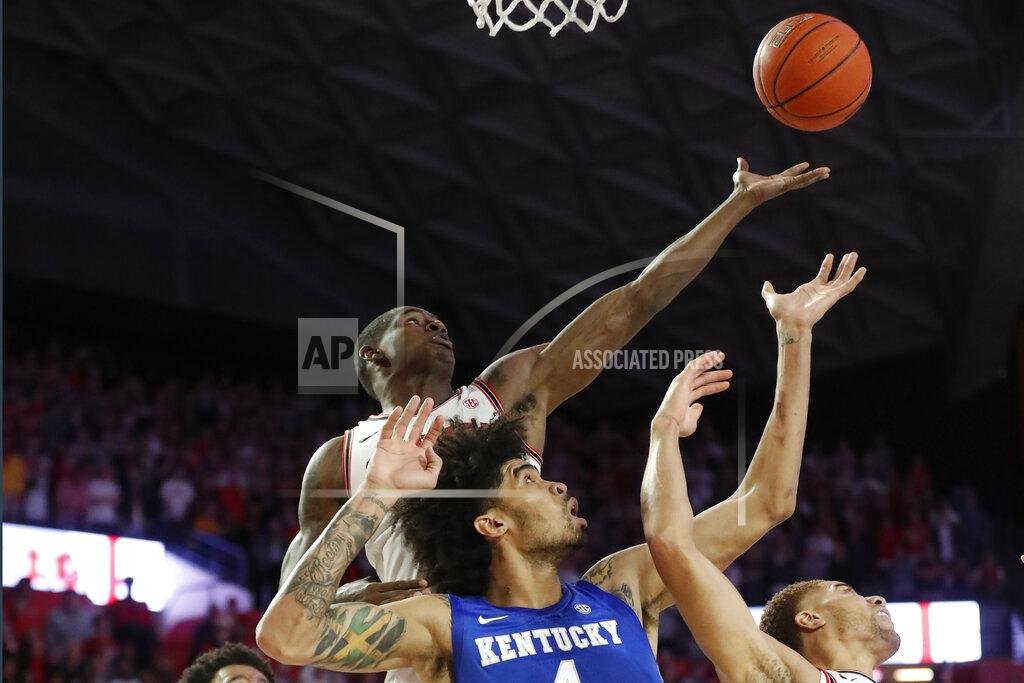 John Bazemore Kentucky forward Nick Richards (4) and Georgia guard Jordan Harris, upper left, vie for a rebound during the second half of an NCAA college basketball game Tuesday, Jan. 7, 2020, in Athens, Ga. Kentucky won 78-69. (AP Photo/John Bazemore)
