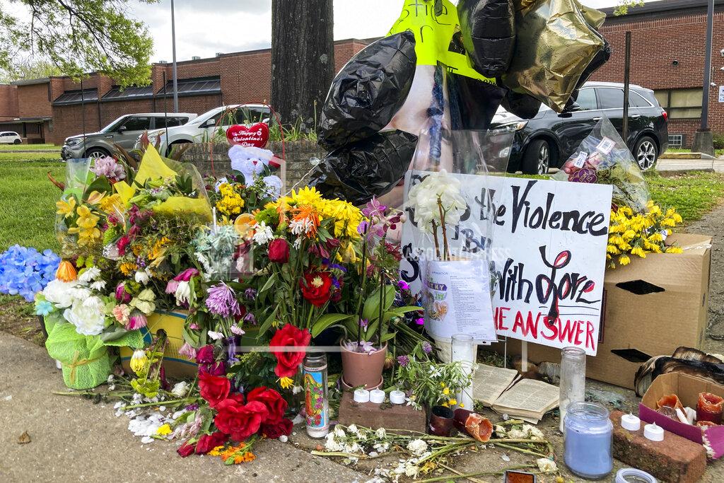 Kimberlee Kruesi In this April 21, 2021 photo, a memorial is seen after a shooting at Austin-East Magnet High School, in Knoxville, Tenn. Members of the Black community in Knoxville are calling for reforms to dispel longstanding disparities between Blacks and whites. They say that is one of the steps that needs to be taken to reduce increasing violence that has claimed the lives of five high school-age students this year. (AP Photo/Kimberlee Kruesi)
