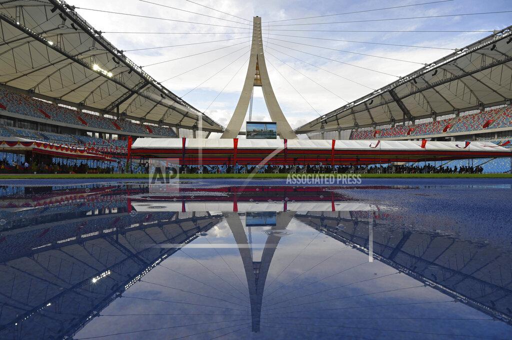 Tang Chhin Sothy The Morodok Techo National Stadium is seen during a ceremony to hand it over to the Cambodian organizing committee of the Southeast Asian Games, in Phnom Penh, Cambodia, Sunday, Sept. 12, 2021. China's Foreign Minister Wang Yi, who attended the ceremony Sunday, met with Prime Minister Hun Sen and other officials to discuss COVID-19 and other regional issues. (Tang Chhin Sothy/Pool Photo via AP)