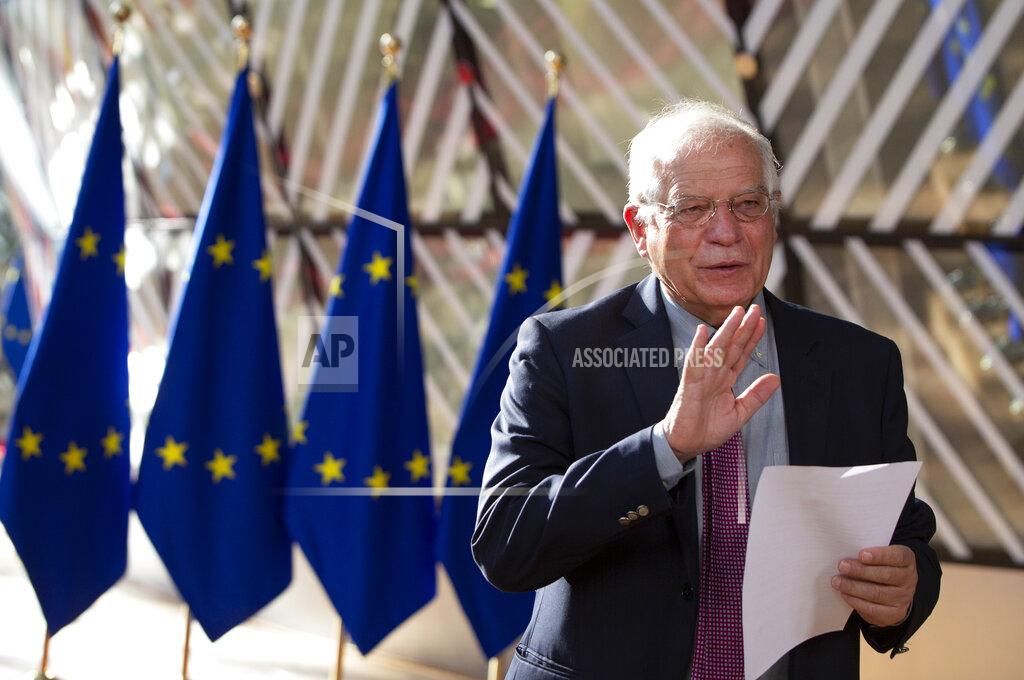 Virginia Mayo European Union foreign policy chief Josep Borrell reads a statement as he arrives for a meeting of EU foreign ministers at the European Council building in Brussels, Monday, July 13, 2020. European Union foreign ministers meet for the first time face-to-face since the pandemic lockdown and will assess their fraught relations with China and discuss the troubled relation with Turkey. (AP Photo/Virginia Mayo, Pool)/