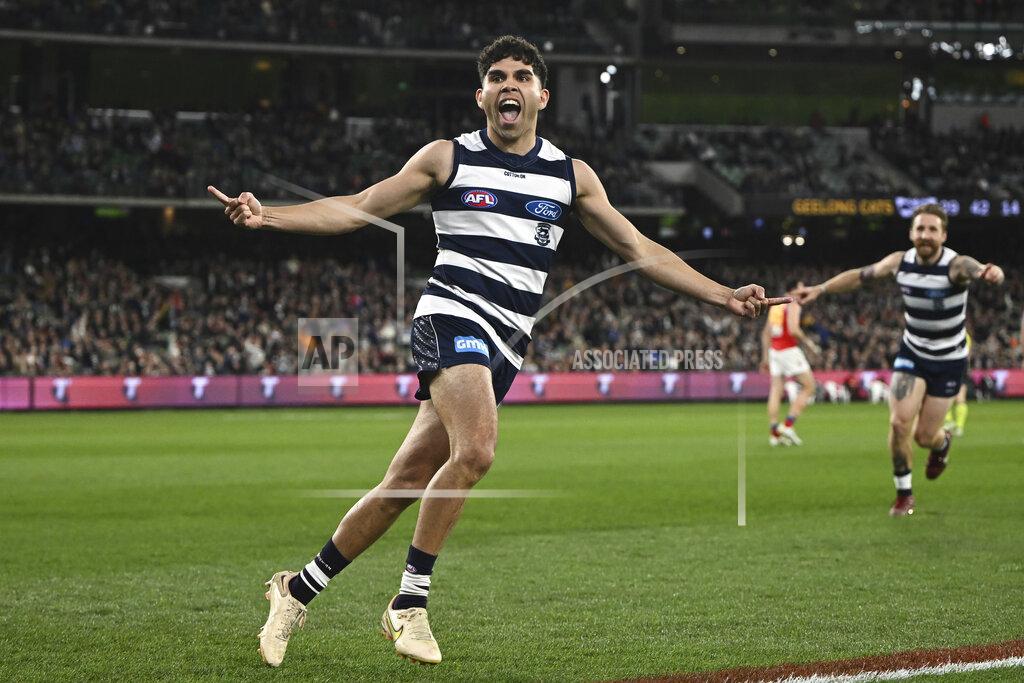Joel Carrett Tyson Stengle of Geelong celebrates kicking a goal during the AFL Preliminary Final match between the Geelong Cats and the Brisbane Lions at the Melbourne Cricket Ground in Melbourne, Friday, Sept. 16, 2022. Early Saturday morning, at a half past midnight, a small but passionate group of fans will gather in front of their TVs in America. They'll be watching the Grand Final, the Super Bowl of Aussie rules football. (AAP Image/Joel Carrett)