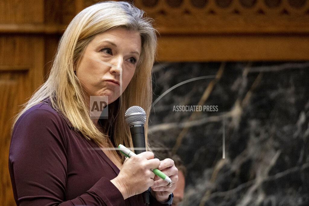 Ben Gray Georgia State Sen. Jennifer Jordan (D-Atlanta) waits for an answer after asking Sen. Mike Dugan (R-Carrollton) a question about the voting bill he presented Monday, March 8, 2021, in Atlanta. (AP Photo/Ben Gray)