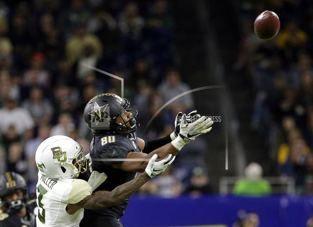 Michael Wyke Vanderbilt tight end Jared Pinkney (80) watches the ball pop out for an incomplete pass under pressure from Baylor safety Chris Miller (3) during the second half of the Texas Bowl NCAA college football game, Thursday, Dec. 27, 2018, in Houston. (AP Photo/Michael Wyke)