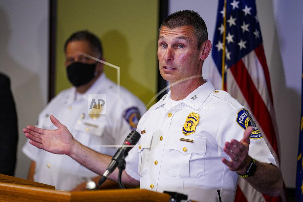 Michael Conroy Deputy Chief Craig McCartt of the Indianapolis Metropolitan Police Department speaks at a news conference following a shooting at a FedEx facility in Indianapolis, Friday, April 16, 2021. A gunman killed several people and wounded others before taking his own life in a late-night attack at a FedEx facility near the Indianapolis airport, police said. (AP Photo/Michael Conroy)