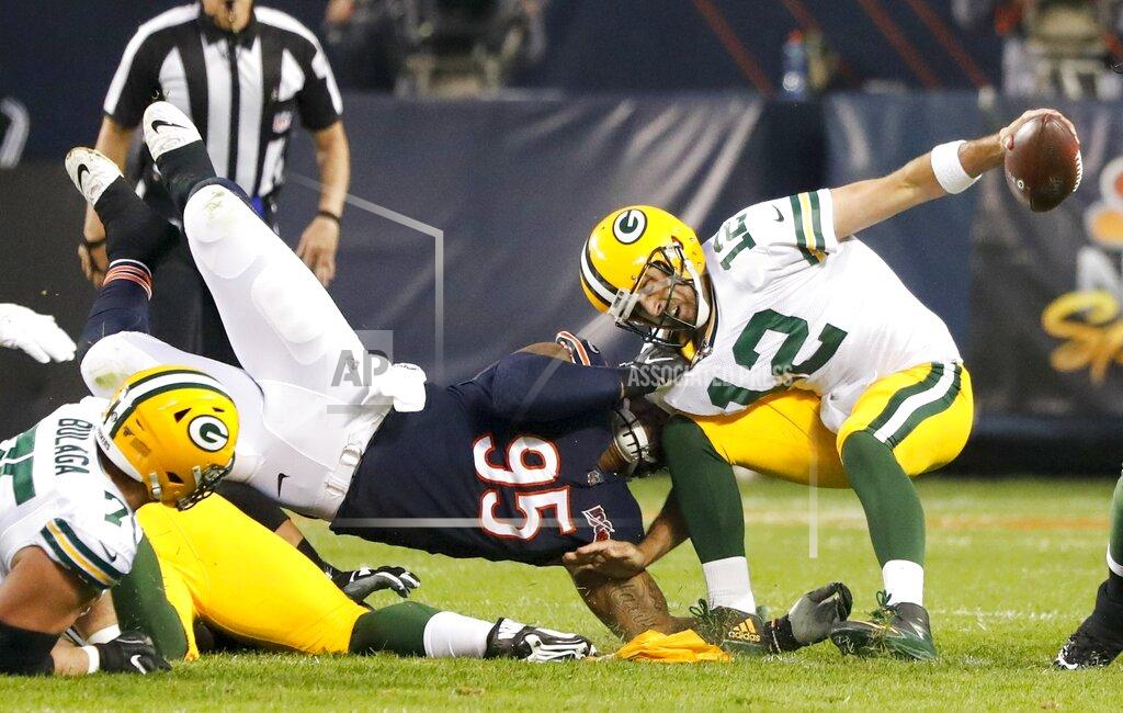Charles Rex Arbogast Chicago Bears' Roy Robertson-Harris sacks Green Bay Packers' Aaron Rodgers during the first half of an NFL football game Thursday, Sept. 5, 2019, in Chicago. (AP Photo/Charles Rex Arbogast)