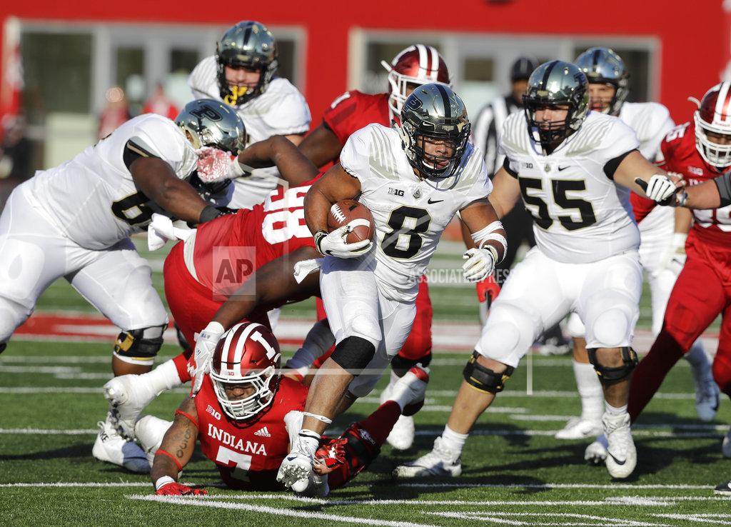 Darron Cummings Purdue's Markell Jones (8) runs out of the tackle of Indiana's Reakwon Jones for a touchdown in the second half of an NCAA college football game, Saturday, Nov. 24, 2018, in Bloomington, Ind. Purdue won 28-21. (AP Photo/Darron Cummings)