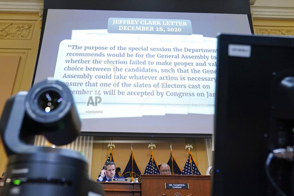 Jacquelyn Martin A portion of a draft letter from Jeffrey Clark is displayed as the House select committee investigating the Jan. 6 attack on the U.S. Capitol continues to reveal its findings of a year-long investigation, at the Capitol in Washington, Thursday, June 23, 2022. (AP Photo/Jacquelyn Martin)