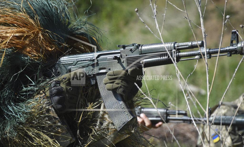Max Pshybyshevsky Ukrainian Territorial Defence Forces members train on the outskirts of Odesa, Ukraine, Tuesday, May 24, 2022. (AP Photo/Max Pshybyshevsky)