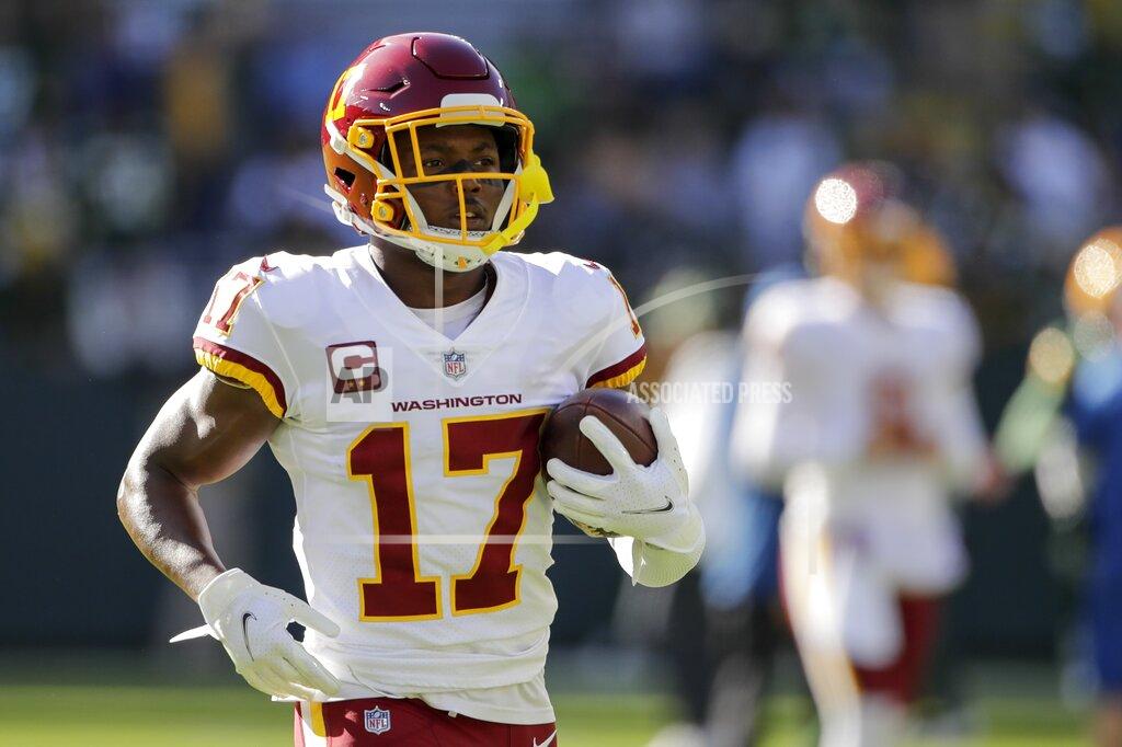 Aaron Gash Washington Football Team's Terry McLaurin warms up before an NFL football game against the Green Bay Packers Sunday, Oct. 24, 2021, in Green Bay, Wis. (AP Photo/Aaron Gash)
