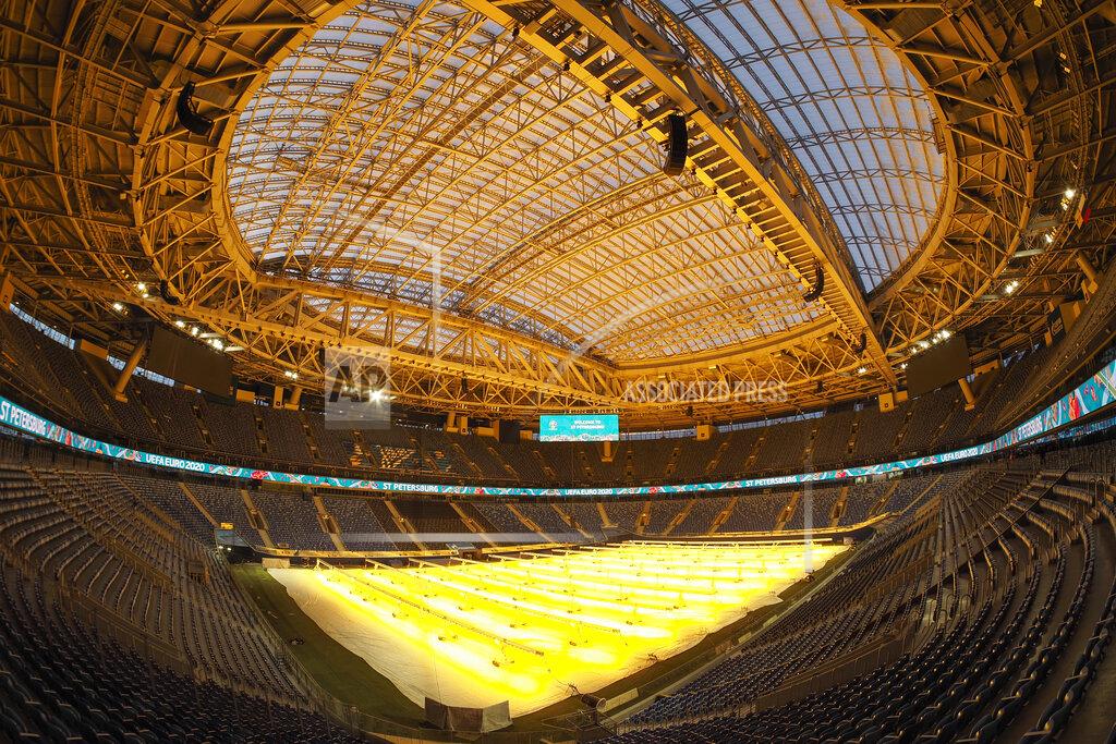Dmitri Lovetsky FILE - In this Thursday, Feb. 11, 2021 filer, a view of the Saint-Petersburg Arena in St. Petersburg, Russia. With coronavirus restrictions eased to allow fans back into stadiums, there at least will be some atmosphere at the tournament after months of games being played without any. Budapest wants all fans to come, while Saint Petersburg and Baku hope to use 50% of stadium capacity. (AP Photo/Dmitri Lovetsky, File)