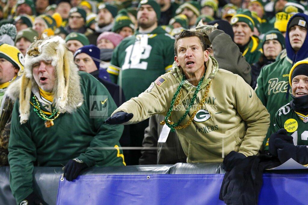 Mike Roemer Green Bay Packers fans yell during the second half of an NFL divisional playoff football game against the Seattle Seahawks Sunday, Jan. 12, 2020, in Green Bay, Wis. (AP Photo/Mike Roemer)