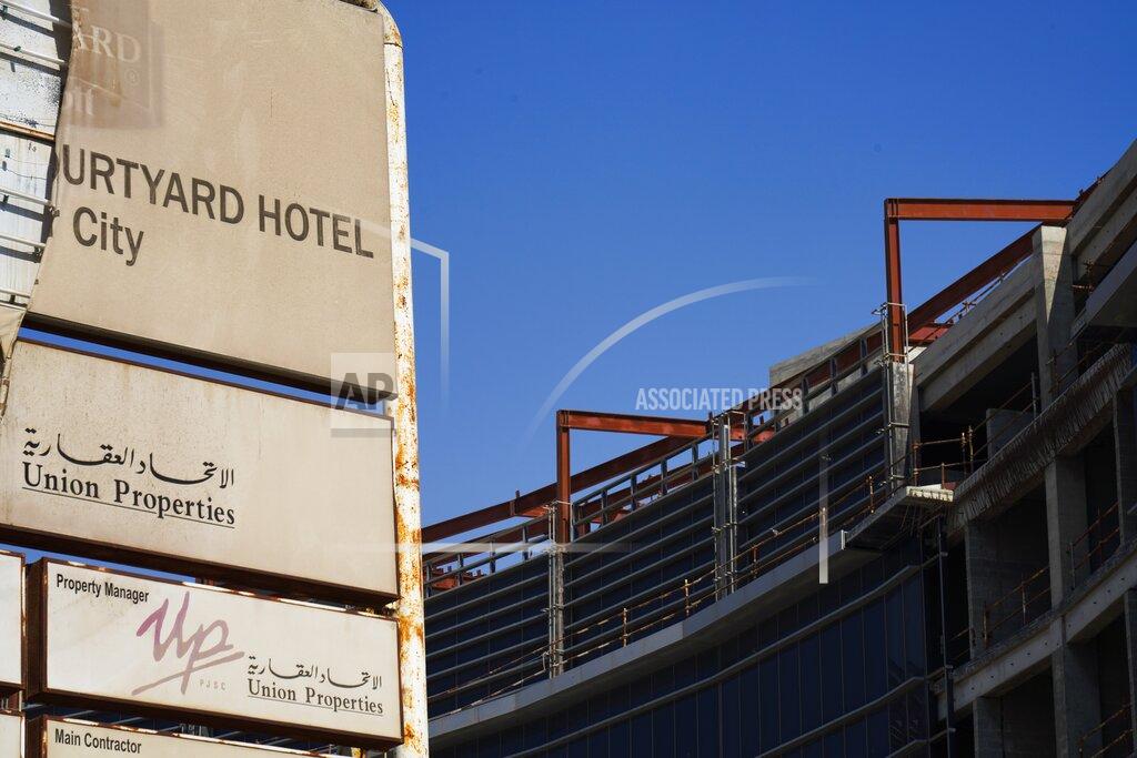 Jon Gambrell A Union Properties construction project in Dubai Motor City unfinished for years is seen in Dubai, United Arab Emirates, Sunday, Oct. 24, 2021. Emirati prosecutors said Sunday they had launched a major investigation into Dubai-based real estate developer Union Properties, saying they would probe allegations that the long-troubled firm committed fraud and other offenses while trying to claw its way out of debt. (AP Photo/Jon Gambrell)