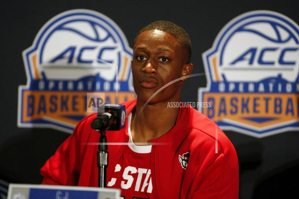 Nell Redmond North Carolina State basketball player CJ Bryce answers a question during the Atlantic Coast Conference NCAA college basketball media day in Charlotte, N.C., Tuesday, Oct. 8, 2019. (AP Photo/Nell Redmond)