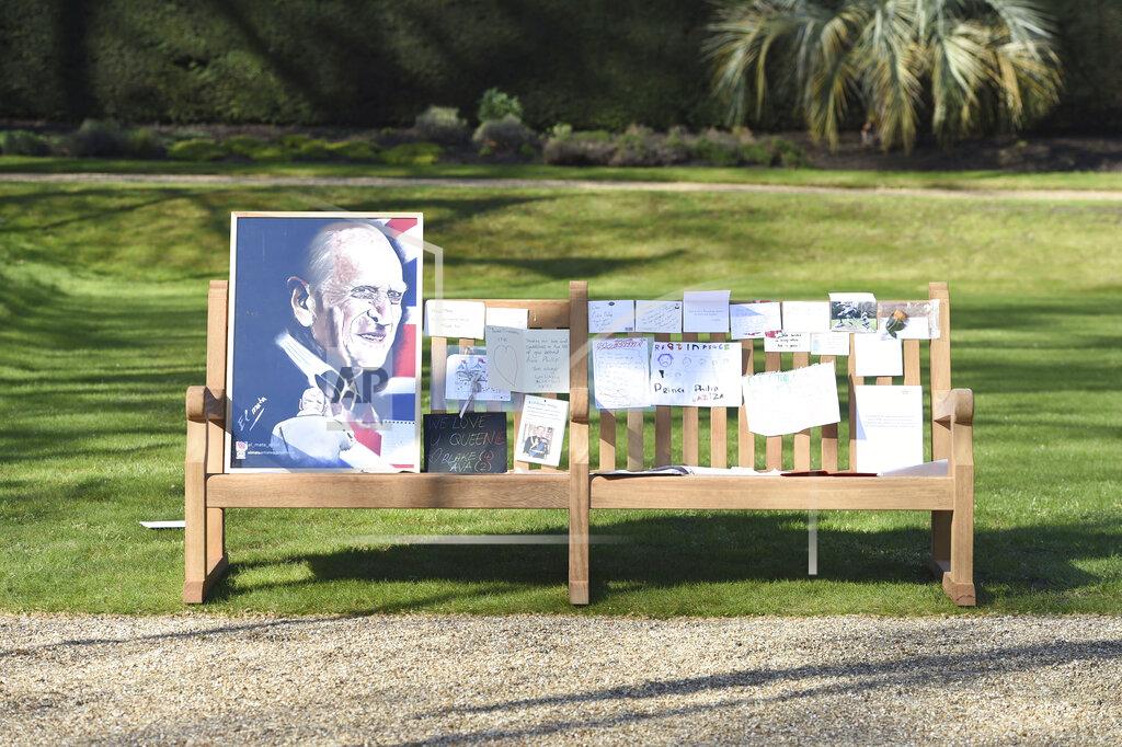 Jeremy Selwyn Tributes and messages left by members of the public left outside Buckingham Palace following the death of Prince Philip, are placed in the gardens of Marlborough House, London, Thursday April 15, 2021. (Jeremy Selwyn/Pool via AP)