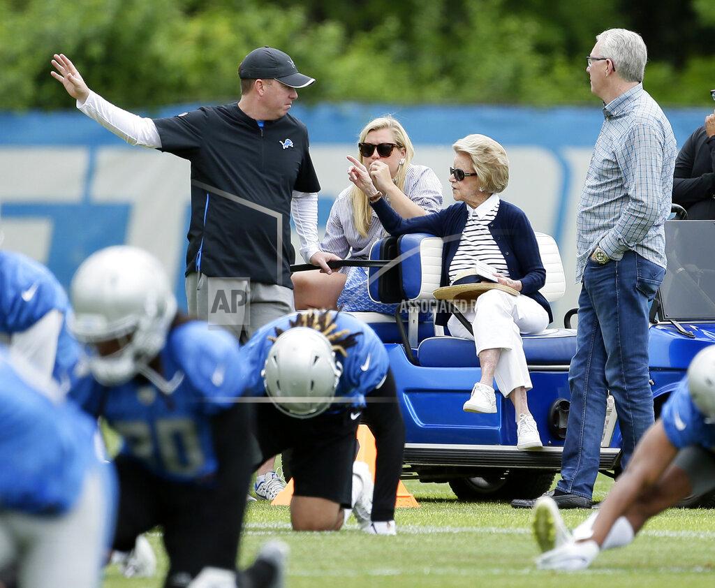 Duane Burleson Detroit Lions owner and chairman Martha Firestone Ford, third from left, watches the Lions NFL football training camp with, from left, General Manager Bob Quinn, granddaughter Eliza Getz and team President Rod Wood Wednesday, June 5, 2019, in Allen Park, Mich. (AP Photo/Duane Burleson)