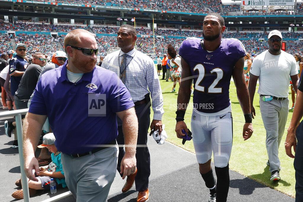 Wilfredo Lee FILE - In this Sunday, Sept. 8, 2019, file photo, Baltimore Ravens cornerback Jimmy Smith (22) walks off the field after an injury during the first half at an NFL football game against the Miami Dolphins, in Miami Gardens, Fla. Jimmy Smith will miss several weeks after spraining his knee in Sunday’s game against Miami. Coach John Harbaugh said Monday, Sept. 9, 2019, that Smith has a Grade 2 sprain of the right knee. (AP Photo/Wilfredo Lee, File)