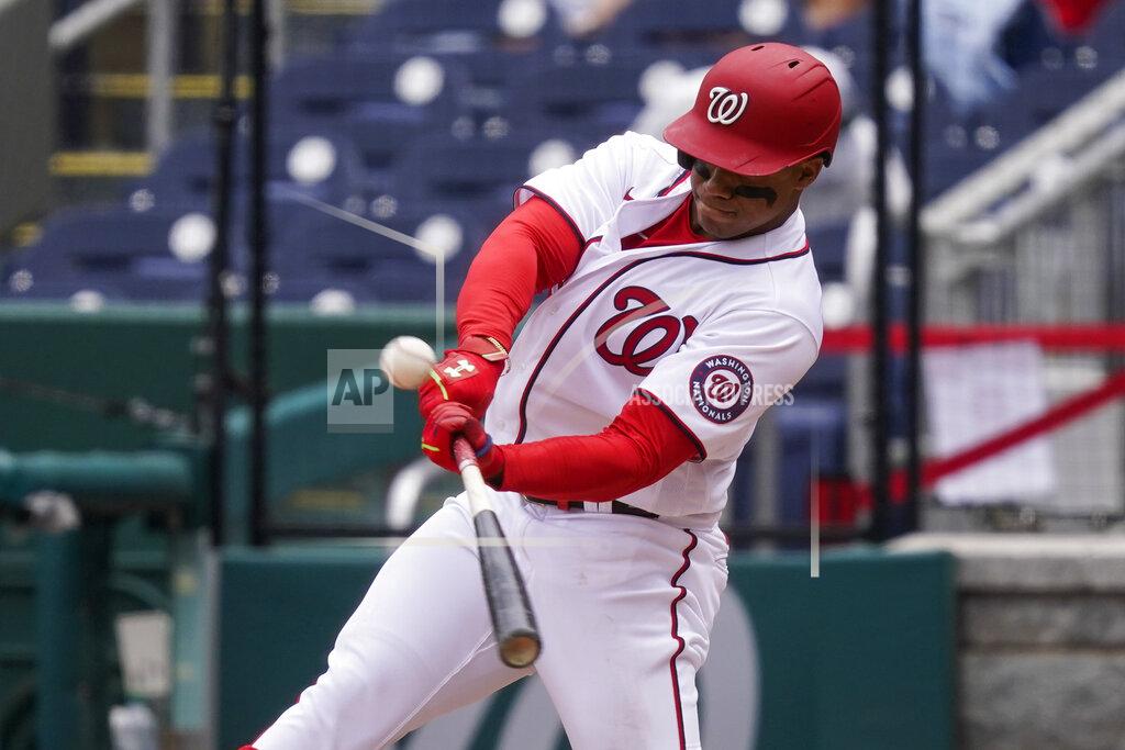 Alex Brandon Washington Nationals' Juan Soto hits a sacrifice fly during the fourth inning of a baseball game against the Arizona Diamondbacks at Nationals Park, Saturday, April 17, 2021, in Washington. (AP Photo/Alex Brandon)
