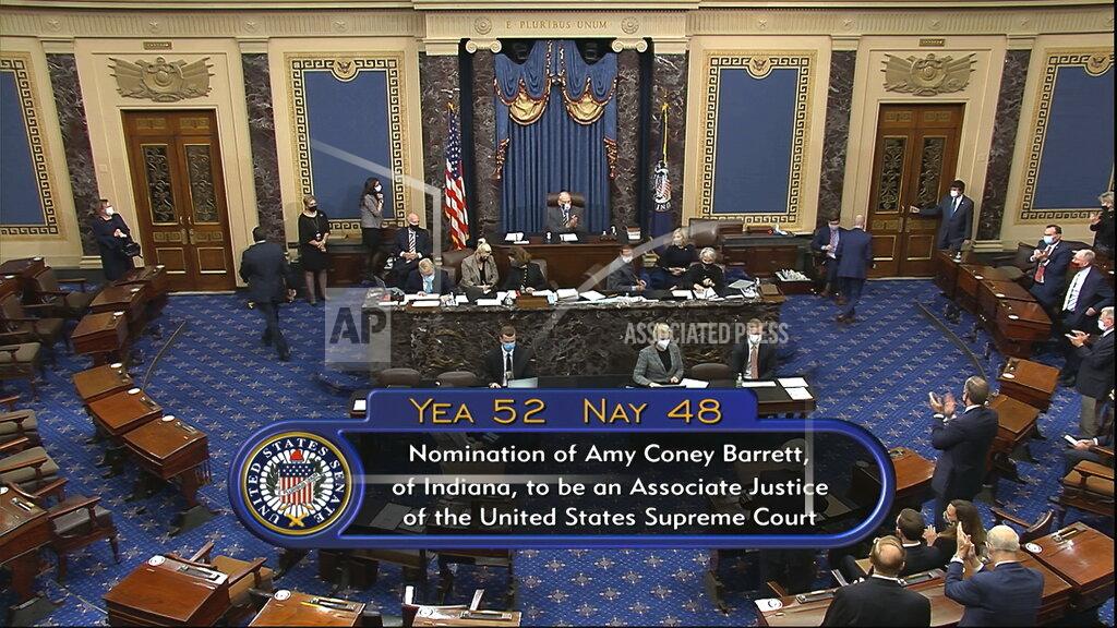 Uncredited In this image from video, the vote total in the U.S. Senate on the confirmation of Amy Coney Barrett to become a Supreme Court justice at the U.S. Capitol in Washington, Monday, Oct. 26, 2020. (Senate Television via AP)