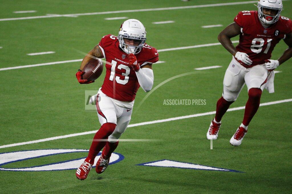 Michael Ainsworth Arizona Cardinals wide receiver Christian Kirk (13) sprints to the end zone for a touchdown followed by Darrell Daniels (81) in the first half of an NFL football game against the Dallas Cowboys in Arlington, Texas, Monday, Oct. 19, 2020. (AP Photo/Michael Ainsworth)