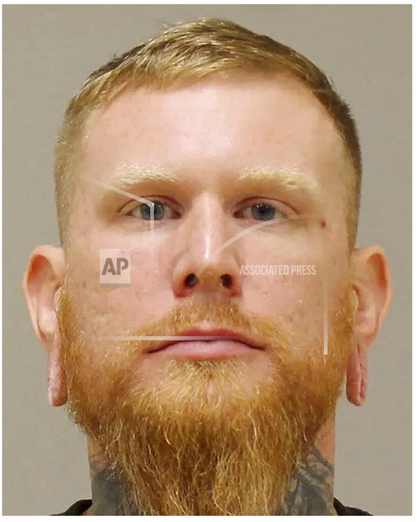 In a photo provided by the Kent County Sheriff, Brandon Caserta is shown in a booking photo. Caserta is one of several people charged with plotting to kidnap Michigan Democratic Gov. Gretchen Whitmer, authorities said Thursday, Oct. 8, 2020, in announcing charges in an alleged scheme that involved months of planning and even rehearsals to snatch Whitmer from her vacation home. (Kent County Sheriff via AP)