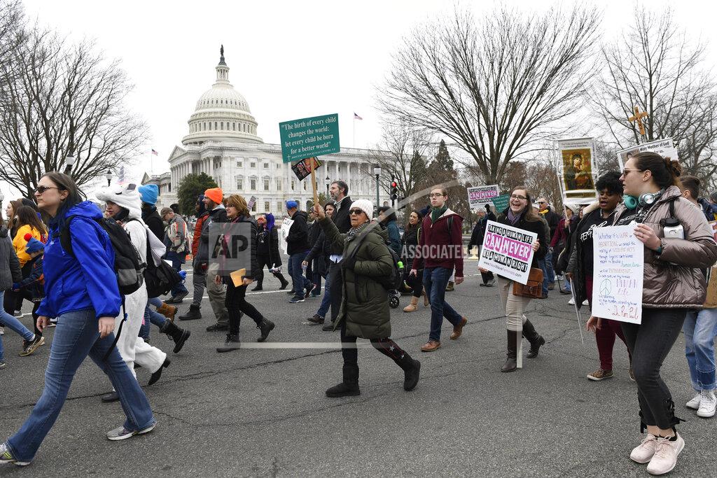 Susan Walsh FILE - In this Jan. 24, 2020, file photo, anti-abortion activists participate in the "March for Life" rally near Capitol Hill in Washington. Anti-abortion leaders across America were elated a year ago when Donald Trump became the first sitting U.S. president to appear in person at their highest-profile annual event, the March for Life held every January. The mood is more sober now — a mix of disappointment over Trump’s defeat and hope that his legacy of judicial appointments will lead to future court victories limiting abortion rights. (AP Photo/Susan Walsh, File)