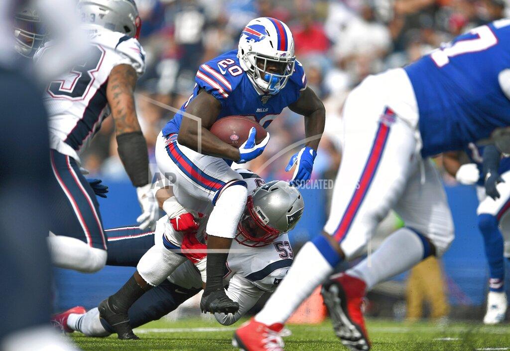 Adrian Kraus Buffalo Bills running back Frank Gore carries the ball as New England Patriots linebacker Kyle Van Noy tries to tackle him in the second half of an NFL football game, Sunday, Sept. 29, 2019, in Orchard Park, N.Y. (AP Photo/Adrian Kraus)