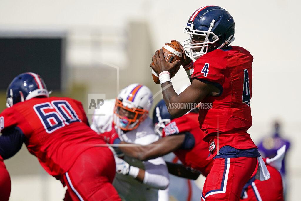 Rogelio V. Solis Jackson State quarterback Jalon Jones (4) drops back to pass against Edward Waters during the first half of an NCAA college football game in Jackson, Miss., Sunday, Feb. 21, 2021. The game marks Sanders's collegiate head coaching debut. (AP Photo/Rogelio V. Solis)