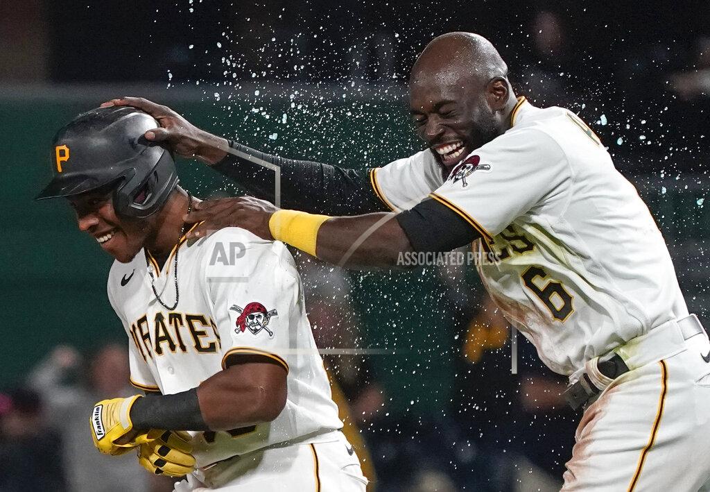 Keith Srakocic Pittsburgh Pirates' Ke'Bryan Hayes, left, celebrates with Anthony Alford after driving in the winning run in the team's baseball game against the Washington Nationals, Friday, Sept. 10, 2021, in Pittsburgh. The Pirates won 4-3. (AP Photo/Keith Srakocic)