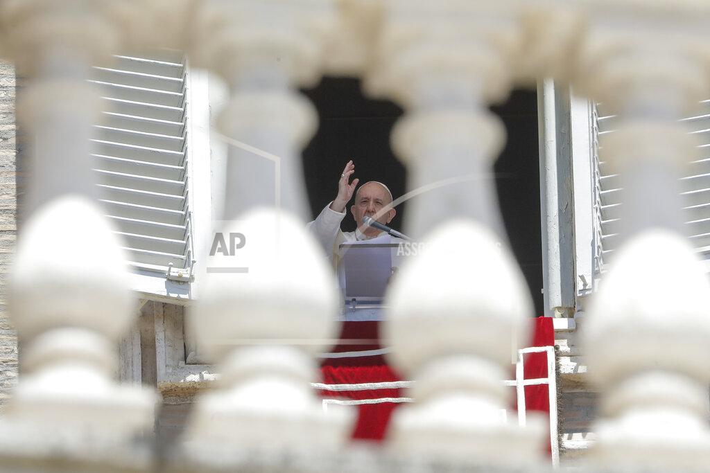 Andrew Medichini Pope Francis delivers his blessing as he recites the Angelus noon prayer from the window of his studio overlooking St.Peter's Square, at the Vatican, Sunday, June 7, 2020. Pope Francis is cautioning people in countries emerging from lockdown to keep following authorities’ rules for COVID-19 contagion containment. Says Francis: “Be careful, don’t cry victory, don’t cry victory too soon.” (AP Photo/Andrew Medichini)
