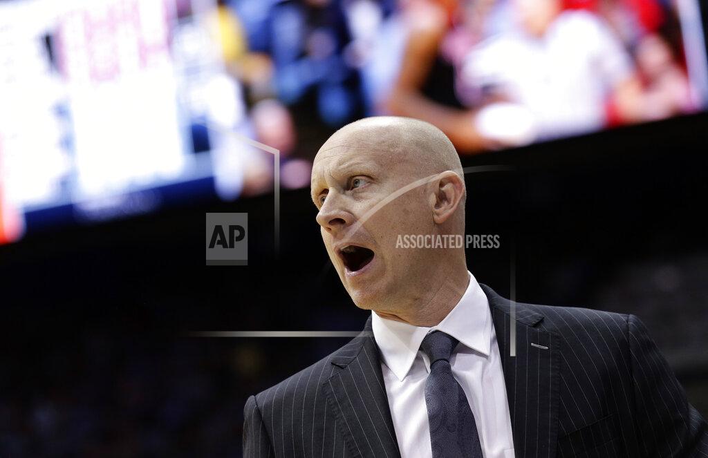 Gerry Broome Louisville head coach Chris Mack directs his team during the first half of an NCAA college basketball game against North Carolina in Chapel Hill, N.C., Saturday, Jan. 12, 2019. (AP Photo/Gerry Broome)