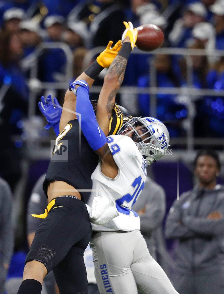 Gerald Herbert Middle Tennessee cornerback Darryl Randolph (29) breaks up a pass intended for Appalachian State wide receiver Corey Xavier Sutton in the first half of the New Orleans Bowl NCAA college football game in New Orleans, Saturday, Dec. 15, 2018. (AP Photo/Gerald Herbert)