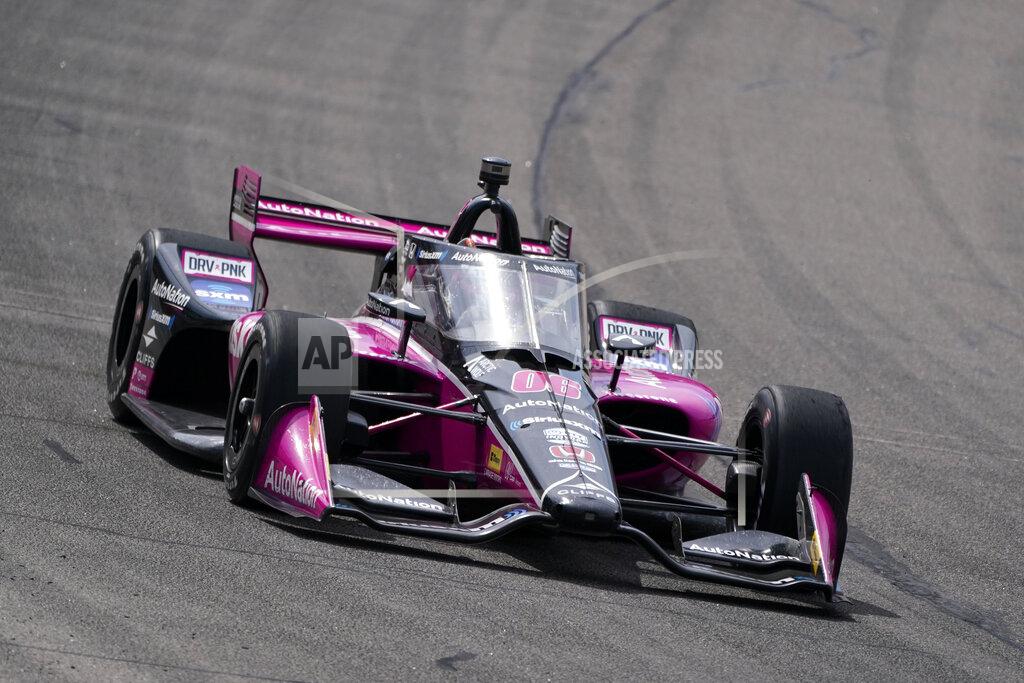 Charlie Neibergall Helio Castroneves, of Brazil, drives during an IndyCar Series auto race, Saturday, July 23, 2022, at Iowa Speedway in Newton, Iowa. (AP Photo/Charlie Neibergall)