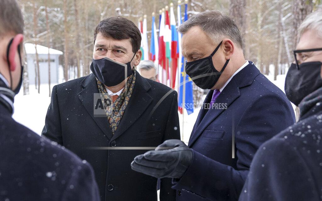 Jakub Szymczuk Poland's President Andrzej Duda chats to welcome Hungary's President Janos Ader for a two-day summit with the presidents of Hungary and The Czech Republic marking 30 years of the Visegrad Group, an informal body of political and economic cooperation in the region, at the presidential residence in the Hel Peninsula, Poland, on Tuesday, Feb. 9, 2021.(Jakub Szymczuk / KPRP via AP )