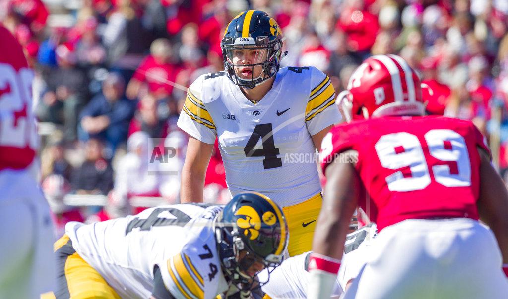 Doug Mcschooler Iowa quarterback Nate Stanley (4) calls a play out to the offense during the first half of an NCAA college football game against Indiana, Saturday, Oct. 13 2018, in Bloomington, Ind. (AP Photo/Doug McSchooler)