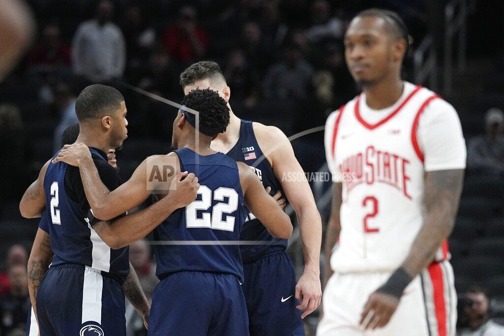 Darron Cummings Penn State's Jalen Pickett (22) talks with his teammates during the second half of an NCAA college basketball game against Ohio State at the Big Ten Conference tournament, Thursday, March 10, 2022, in Indianapolis. (AP Photo/Darron Cummings)