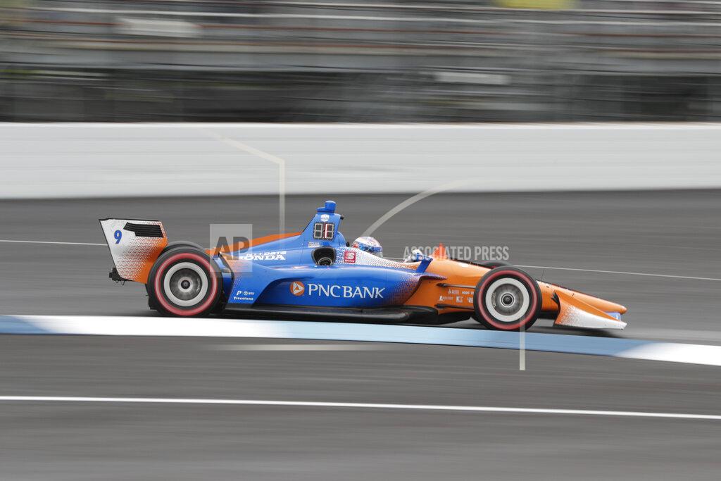 Michael Conroy Scott Dixon, of New Zealand, drives through the first turn during the Indy GP IndyCar auto race at Indianapolis Motor Speedway, Saturday, May 11, 2019 in Indianapolis. (AP Photo/Michael Conroy)