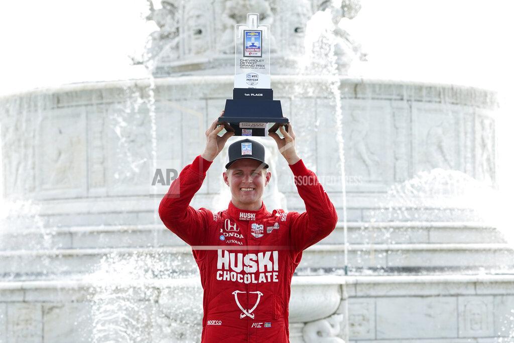Paul Sancya Marcus Ericsson, of Sweden, celebrates winning the first race of the IndyCar Detroit Grand Prix auto racing doubleheader on Belle Isle in Detroit, Saturday, June 12, 2021. (AP Photo/Paul Sancya)