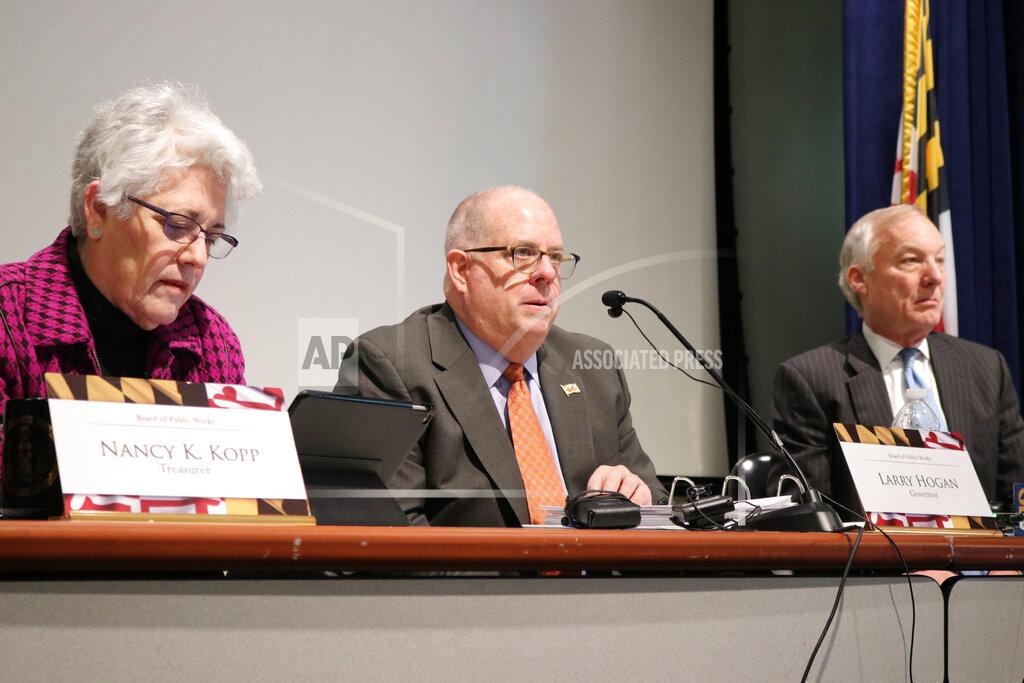 FILE - Maryland Board of Public Works, shown in a March 2020 photo, is scheduled to consider state budget cuts Wednesday, July 1, 2020 in response to the impact of COVID-19 on the economy. (AP Photo/Brian Witte, File)