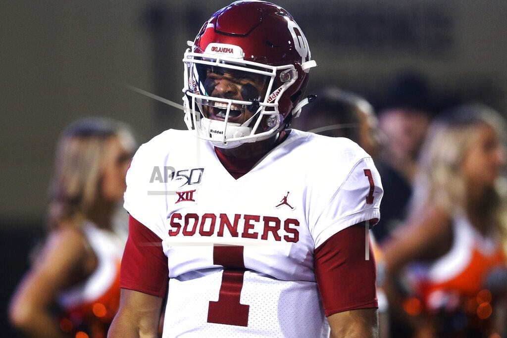 Ian Maule Oklahoma quarterback Jalen Hurts (1) yells in celebration after scoring a touchdown during an NCAA college football game against Oklahoma State, Saturday, Nov. 30, 2019, in Stillwater, Okla. (Ian Maule/Tulsa World via AP)