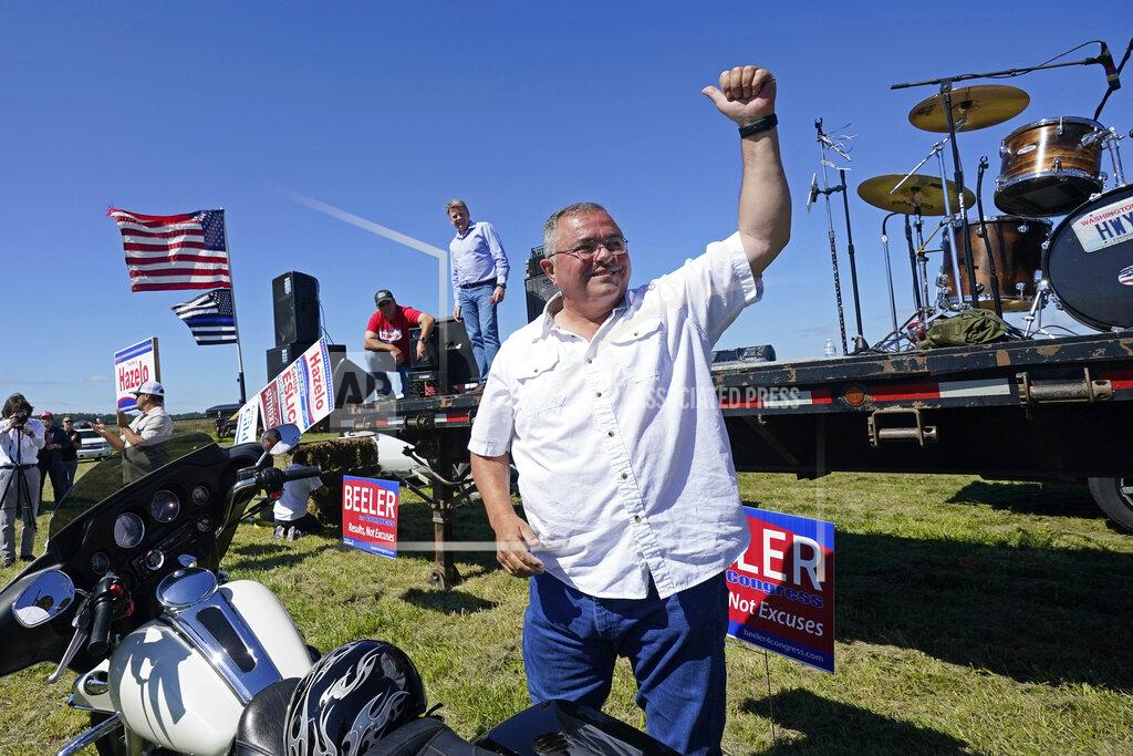 Elaine Thompson FILE - Republican gubernatorial candidate Loren Culp smiles while greeting supporters as he arrives at a rally Aug. 29, 2020, in Mount Vernon, Wash. Republican Rep. Dan Newhouse, who voted to impeach Donald Trump over the Jan. 6 insurrection, appeared well positioned Friday, Aug. 5, 2022, to advance to the general election in his Washington state primary. Newhouse, the four-term incumbent in the 4th Congressional District in central Washington, had about 26% of the vote. Culp, a Trump-endorsed former small town police chief who lost the 2020 governor’s race to Democrat Jay Inslee, was at about 21 21%. (AP Photo/Elaine Thompson, File)