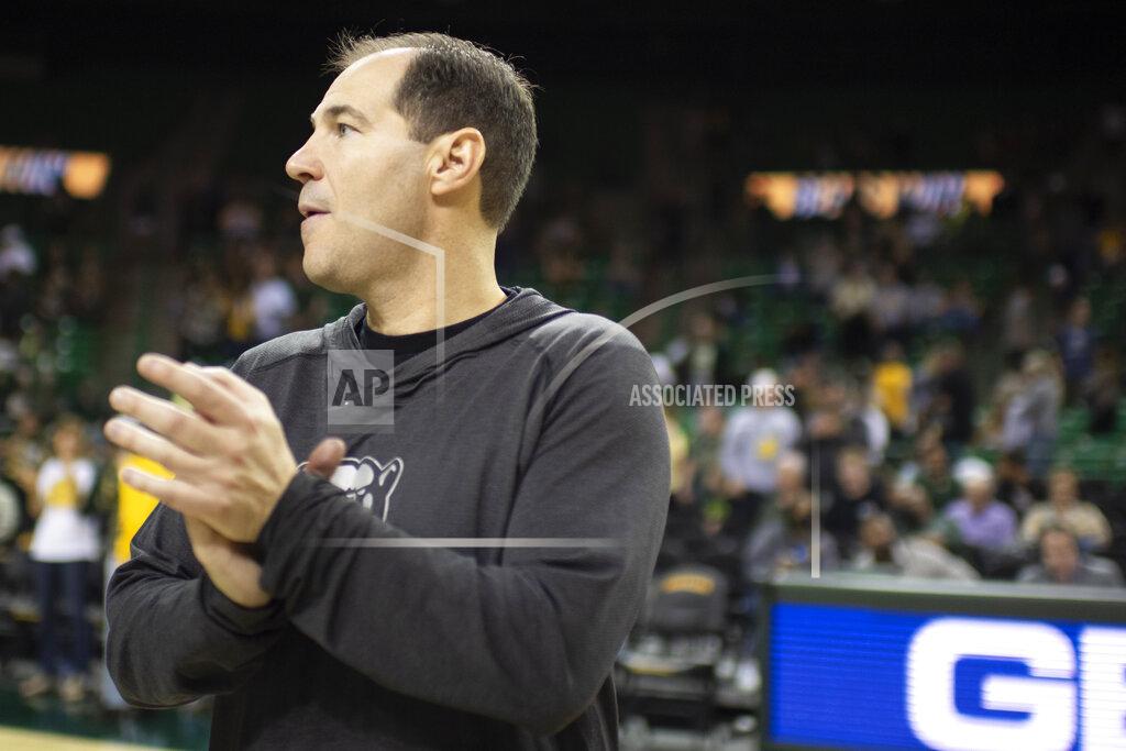 Emil Lippe Baylor head coach Scott Drew applauds following the end of an NCAA college basketball game against Arkansas Pine Bluff in Waco, Texas, Saturday, Dec. 4, 2021. (AP Photo/Emil Lippe)