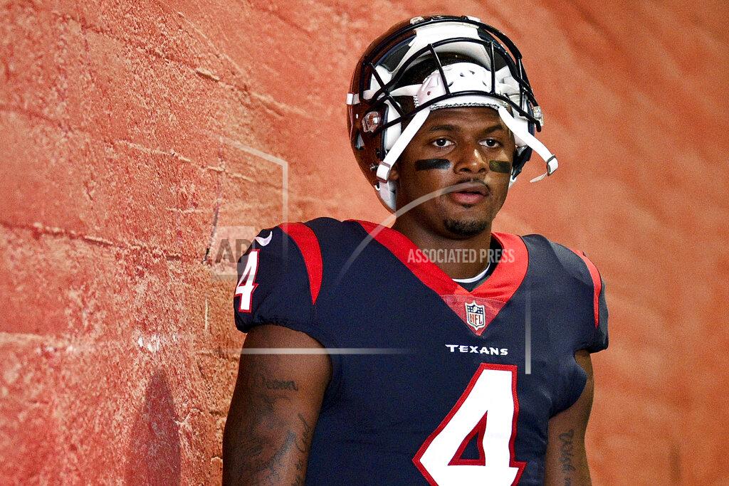 Kelvin Kuo FILE - In this Aug. 25, 2018, file photo, Houston Texans quarterback Deshaun Watson prepares to take the field prior to an NFL preseason football game against the Los Angeles Rams in Los Angeles. Watson has been sued by four more women who accuse him of sexual assault and harassments. The lawsuits were filed Thursday night, March 18, 2021, hours after the NFL said it was investigating earlier allegations by three massage therapists who said the quarterback sexually assaulted them during massages. (AP Photo/Kelvin Kuo, File)