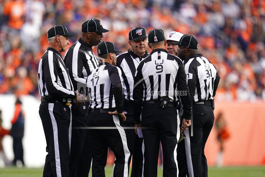 Jack Dempsey In this Nov. 3, 2019, file photo, officials discuss a call during the first half of an NFL football game between the Cleveland Browns and the Denver Broncos in Denver. Two teams have suggested changes to game officiating, including a "sky judge" utilized by colleges, among seven rules proposals that will be presented to team owners later this month. (AP Photo/Jack Dempsey, File)