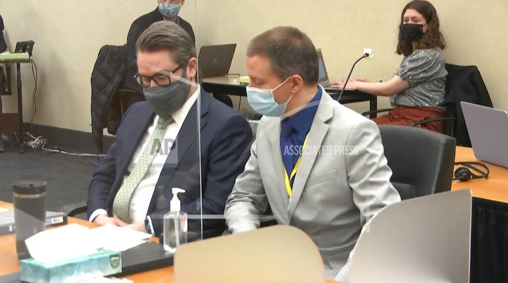 Uncredited In this image from video, defense attorney Eric Nelson, left, and defendant, former Minneapolis police officer Derek Chauvin listen to Hennepin County Judge Peter Cahill read instructions to the jury before closing arguments, Monday, April 19, 2021, in the trial of Chauvin at the Hennepin County Courthouse in Minneapolis. Chauvin is charged in the May 25, 2020 death of George Floyd. (Court TV via AP, Pool)
