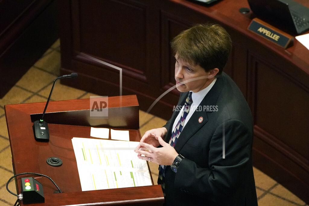 Rogelio V. Solis Attorney Justin Matheny with the Mississippi attorney general's office argues before the Mississippi Supreme Court, Wednesday, April 14, 2021, in Jackson, in defense of Mississippi's initiative process. A lawsuit by Madison Mayor Mary Hawkins Butler challenges the initiative process and seeks to invalidate a medical marijuana initiative that Mississippi voters approved in November 2020. (AP Photo/Rogelio V. Solis)