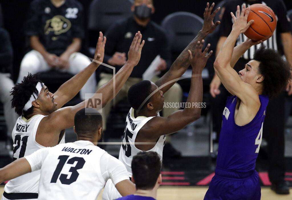 Isaac Brekken Washington's Nate Pryor (4) shoots against Colorado during the first half of an NCAA college basketball game, Sunday, Dec. 20, 2020, in Las Vegas. (AP Photo/Isaac Brekken)