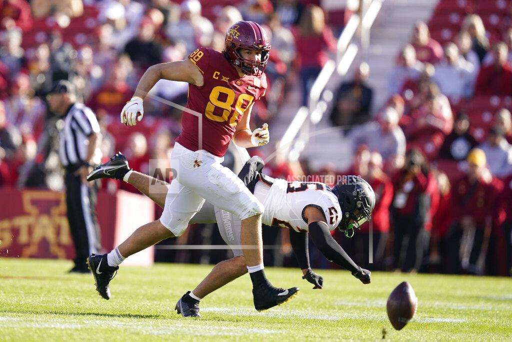 Charlie Neibergall Oklahoma State safety Jason Taylor II (25) breaks up a pass intended for Iowa State tight end Charlie Kolar (88) during the first half of an NCAA college football game, Saturday, Oct. 23, 2021, in Ames, Iowa. (AP Photo/Charlie Neibergall)